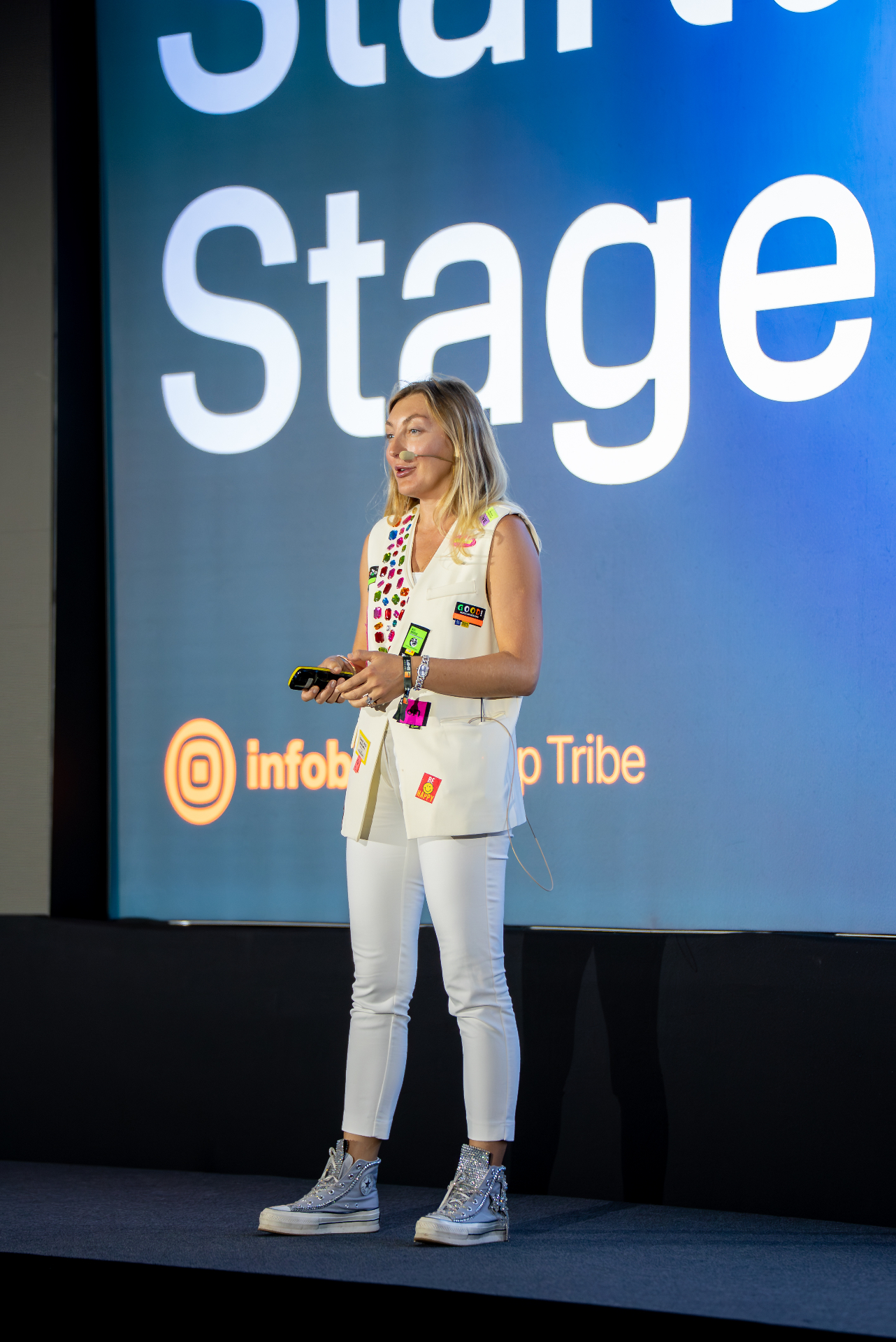 Olya keynoting on stage